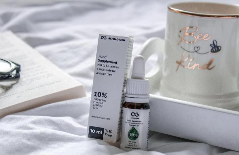 Alphagreen influencer review showing customer using CBD product