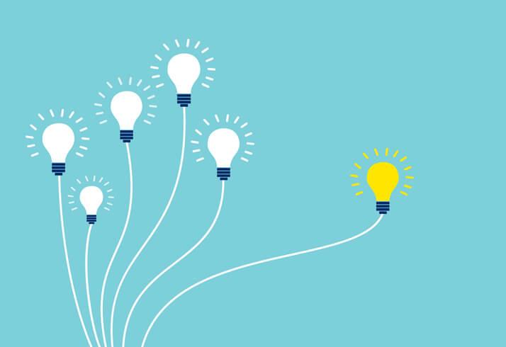 An illustration of five white light bulbs in close proximity and one yellow light bulb located far from the rest, indicating finding a good VC orphan acquisition opportunity.